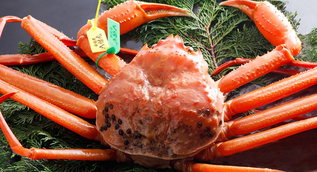 香住 荒神の宿 三宝の食べきれない量のカニの写真