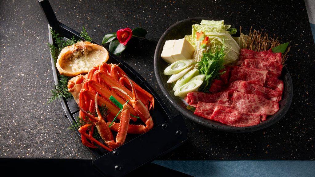 香住 なごみの香風の宿 さだ助の食べきれない量のカニの写真